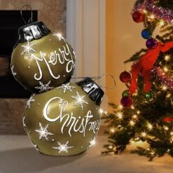 Alpine Holiday "Merry Christmas" Stacked Ornaments Statue With Color Changing LED Lights, Gold -Northlight Shop alpine christmas novelty lights zty139m 31 1000