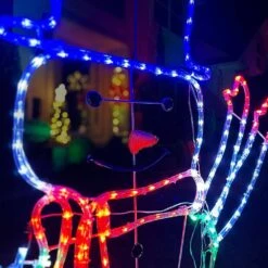 5-Ft. Prelit LED Christmas Snowman With Waving Arm Movement, Colorful Light Up Decoration -Northlight Shop fraser hill farm christmas novelty lights ffchled060 sn2 mlt 44 1000
